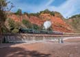 Photograph of CLUN CASTLE - 7029 CLUN CASTLE &  45596 BAHAMAS at Dawlish on 06/09/25