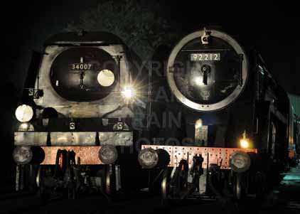 Purchase photo of 34007 WADEBRIDGE &  92212 9F at Mid Hants Railway